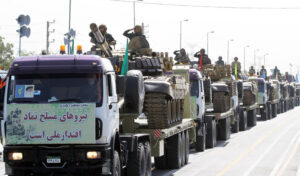 The Army of the Guardians of the Islamic Revolution presents its battle tanks at the parade to mark Holy Defense Week.